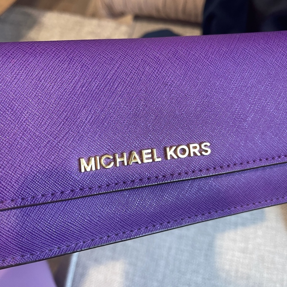 Great condition Michael kors wallet purple